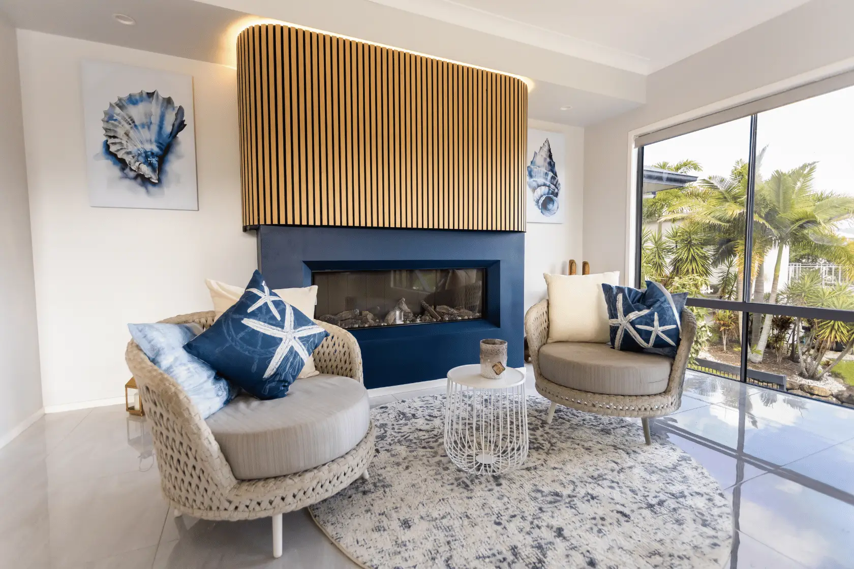 Renovated living room with feature fireplace on the Gold Coast